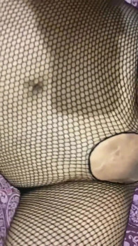 Wildenglishbbw laying in bed in fishnet body suite