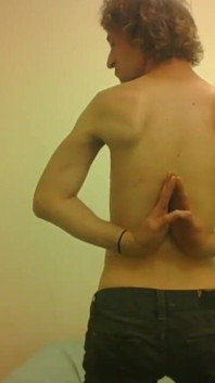 Topless Transgirl Surprised at Her Own Flexibility