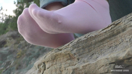 Mistress Legs: Sexy feet in pink ankle socks on the seashore