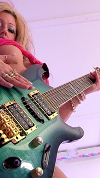 Blonde Big Tits MILF Ely Pink Is a Sexy Rock Chick Addicted to Fucking Big White Cock
