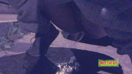 Most Evil Girl: Girl alone at night in a parking lot lowers her...
