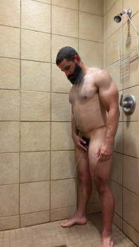 Muscle Cub with Dildo in Gym Showers