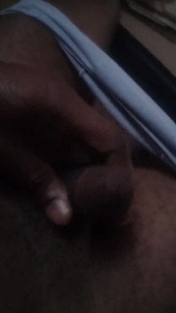 Masturbating