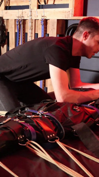 Edging the Boy in Leather Bondage but He Is Not Allowed to Orgasm