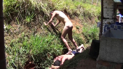Femdom Austria: Nude babe stomping her slave in the backyard