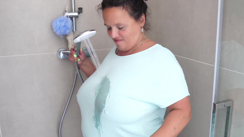 CurvyMature: Mature Brunette with Massive Tits Gets Steamy in the Shower