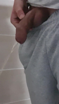 Guy Long Pissing with Uncircumcised Cock and Big Balls