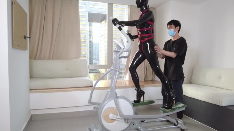 Aisan girl bondage: Mz27 - a Girl Bound in Latex Walks on a Treadmill