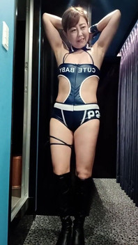 Japanese Mature Woman Wearing a New Costume