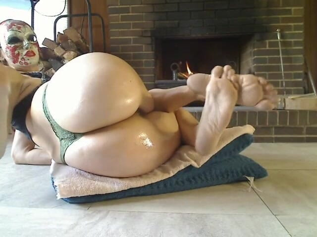 Long Toe Sally Big Buns: Oiled ass next to a fire place