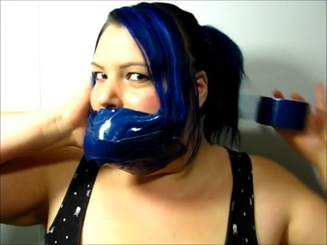 Selfgags classic: Layla makes herself another cruel, tight, and massive gag with 18...