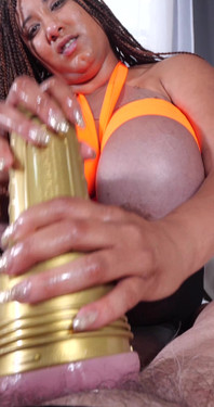 Danni Strokes a Big Cock with Help