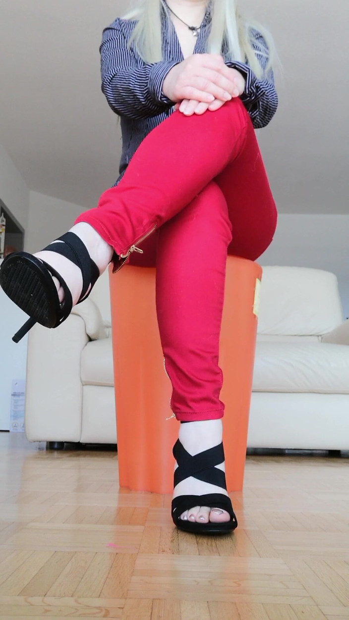 RavenBigAss: Raven Toe-tapping with Crossed Legs Red Jeans and High-heeled Sandals