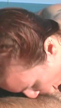 An Adventurous Redhead Chick Is Fucking a Guy in the Middle of the Open Sea