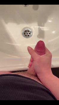 Masturbating
