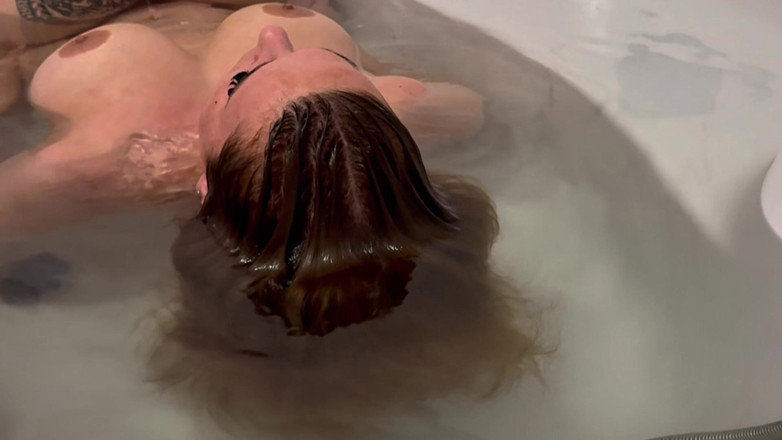 Emeli: Hair Floating on Water Close up