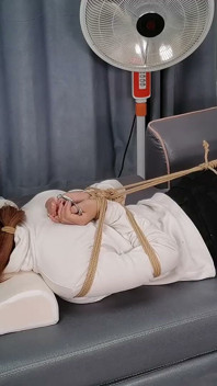 The Extreme Restraints of a Barefoot Girl, Playing with Her Bare Feet