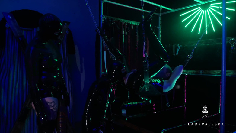 Lady Valeska: The rubber Domme the giant dildo and the gimp