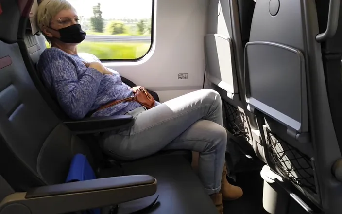 Mature_cunt: Public train crossed legs orgasm