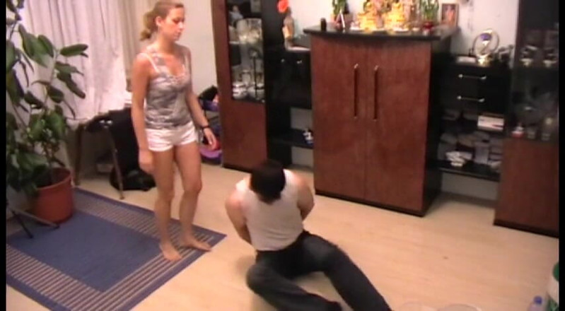 Femdom Austria: She enjoys kicking her slave