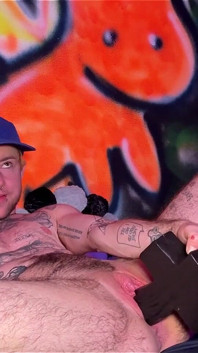 Tattooed Tboy XXX Skips Stretches His Pink Boy Pussy with an Xl Cross Dildo