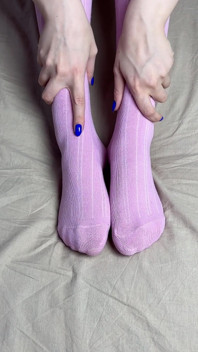 Pink Socks in Hands of Mistress with Blue Nails in Solo Video