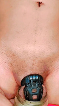 Standing Pissing in Chastity Cage