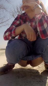 Desperate Babe with Full Bladder Empty Her Bladder and Pee on a Dirt Road