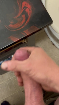 Masturbating