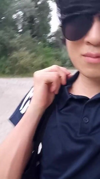 This Asian Gay Twink Has Something Shoved up His Ass and Sticking Out of His Butt as He Walks in Front of Everyone