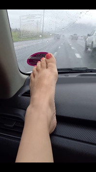 Feet on the Dashboard. a Little Peek at My Legs