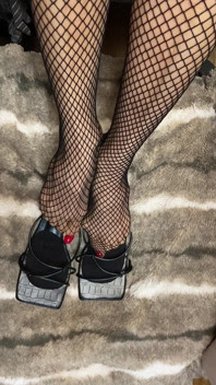 Fishnet in Open Toe Shoes with Red Nail Polish