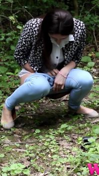 Desperate Girl Full Bladder Pee in the Forest and Empty Herself on the Ground