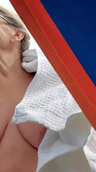 Sexy Granny Swims Naked in a Lake!