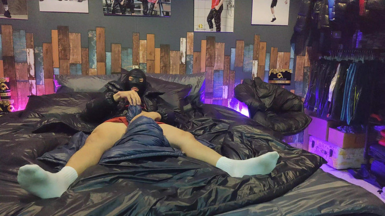Evilshaman: Cock Rubbing Down Jacket on Shiny Nylon Bed