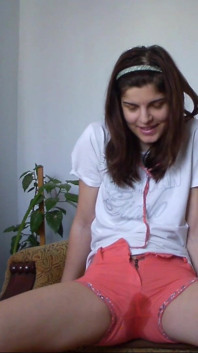 Sexy Teen Has Full Bladder and She Is Desperate to Pee so She Empty Her Bladder in Her Short Pants