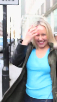 Ashley Rider walks on streets of downtown