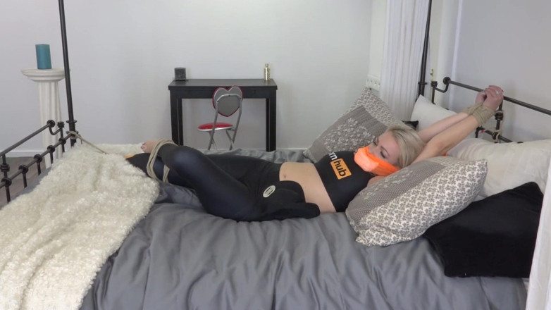 Restricting Ropes: Penny Lee, blonde slut bondaged on the bed