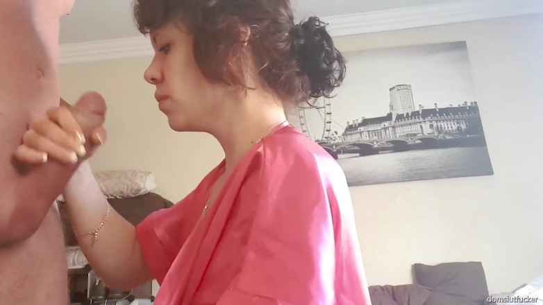 domslutfucker: Girl in Pink Robe Sucking Cock and Giving Handjob Till...