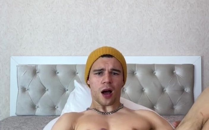 Max_Russell: A Young, Strong Guy Jerks off a Big Dick Lying...