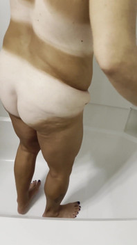 Undressing and peeing in the tub