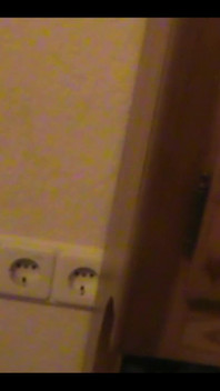 Robe-wearing Dominatrix