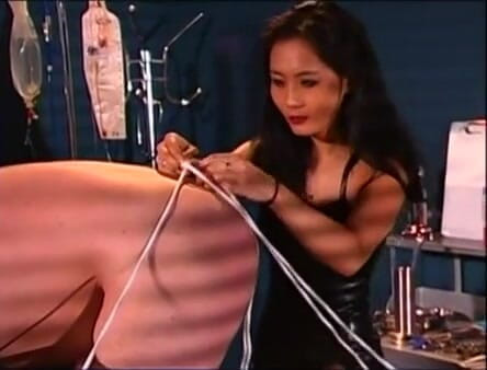 Femdom Austria: Asian Mistress ties up her slave