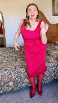 Hot MILF Teasing in Red Stockings and High Heels Shoes
