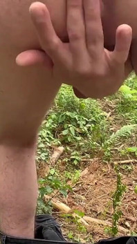 Young boy flashing, spanking ass and masturbating in forest