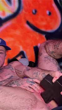 Tattooed Tboy XXX Skips Stretches His Pink Boy Pussy with an Xl Cross Dildo