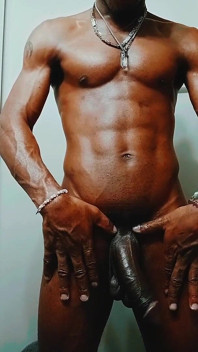 Oiling up My Big Black Cock
