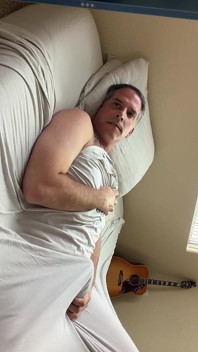 Duke Silver Plays the Trombone in Bed