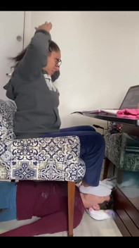 Kiffa Uses Slave as Footstool as She Uses Her Notebook