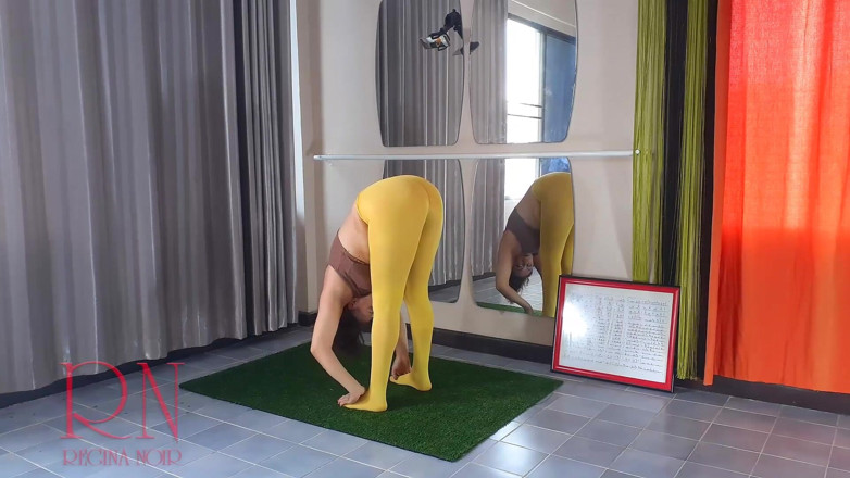 Regina Noir: Regina Noir. Yoga in yellow tights doing yoga in the...